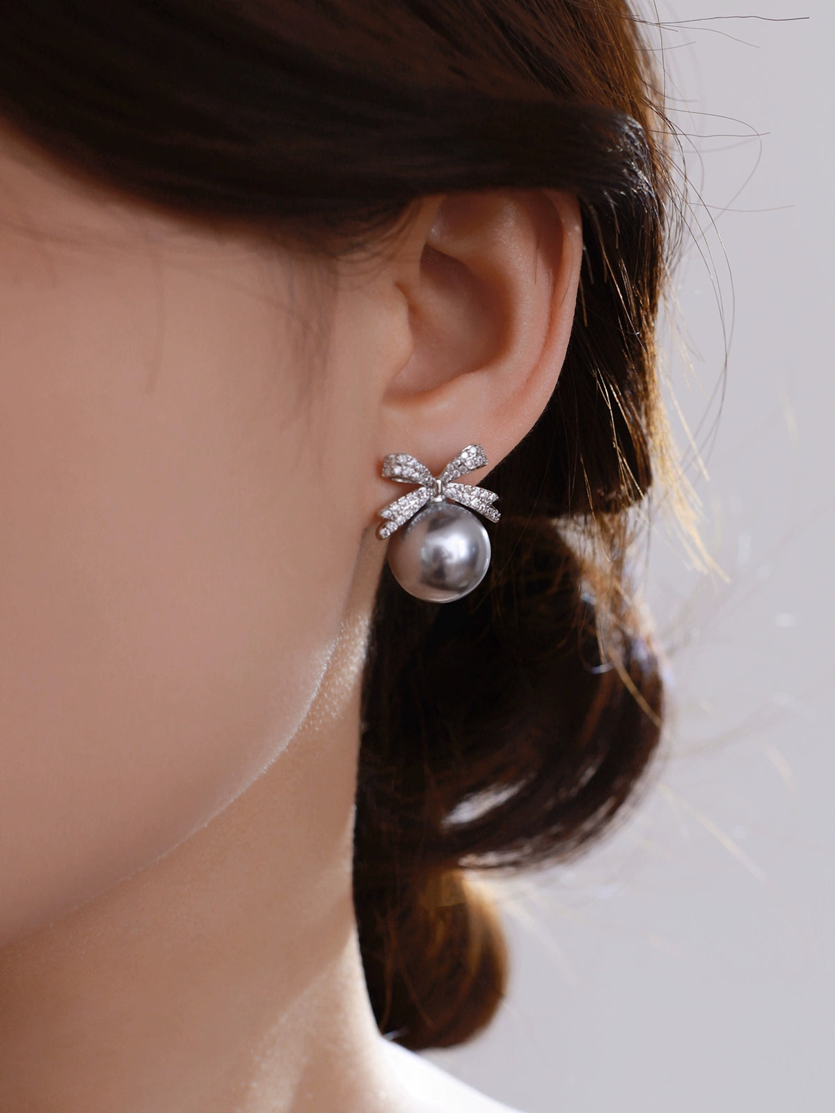 Bow pearl stud earrings women's 2025 new popular Aobai 12mm high-end light luxury texture temperament sterling silver