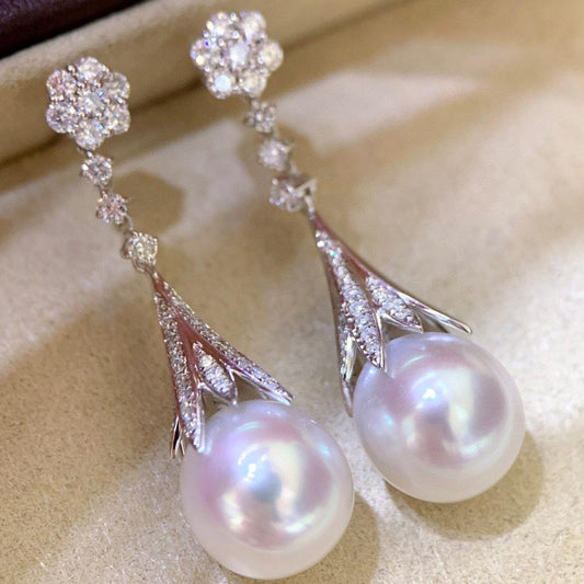 Zhuji natural pearl earrings wholesale 10-11mm round baby muscle translucent strong mirror luster almost flawless