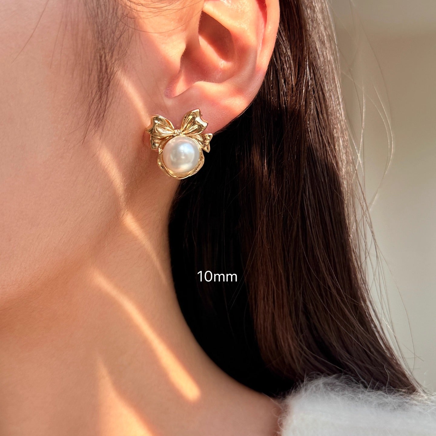 High-End Light Luxury White Pearl Bow Stud Earrings for Women - 2025 Collection