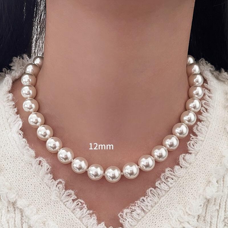 Necklace is round white necklace