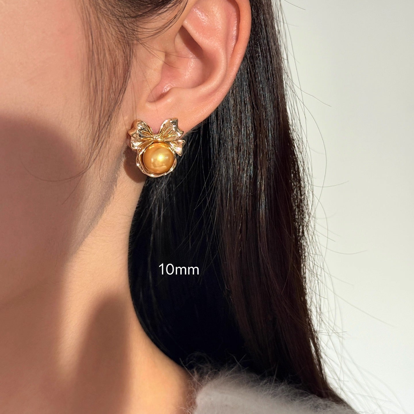 High-End Light Luxury White Pearl Bow Stud Earrings for Women - 2025 Collection