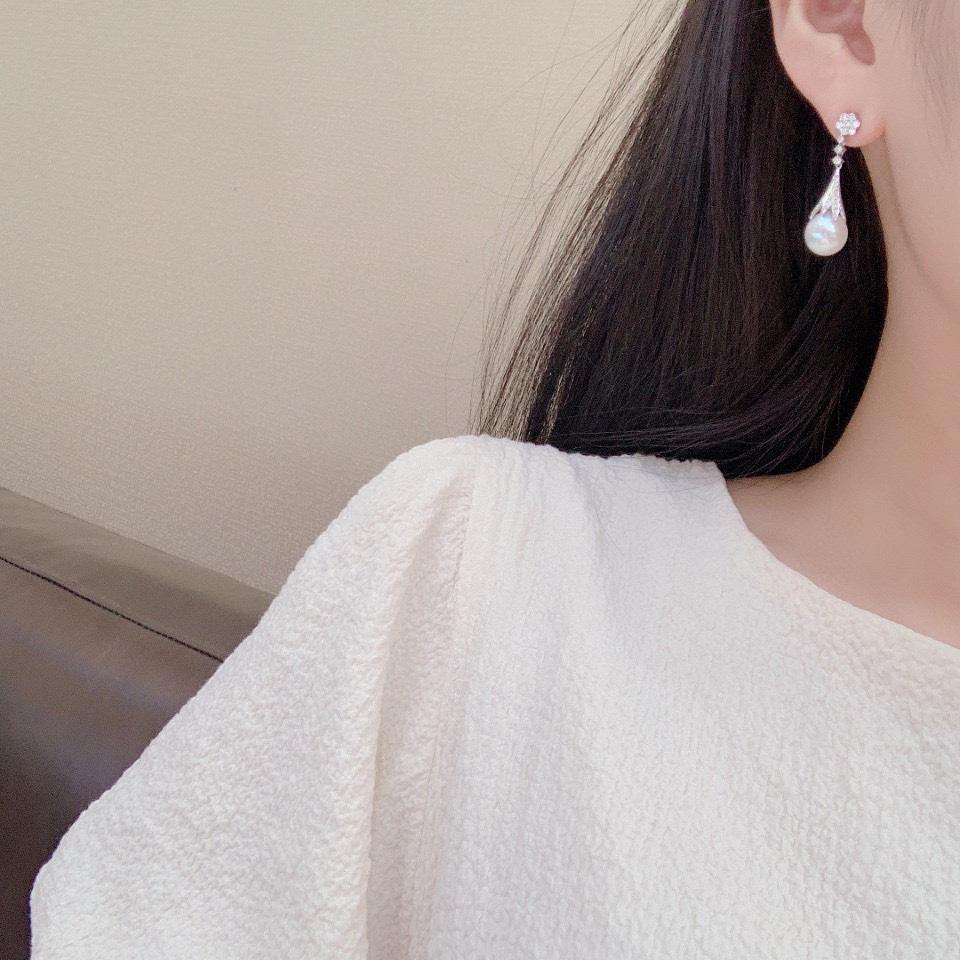 Zhuji natural pearl earrings wholesale 10-11mm round baby muscle translucent strong mirror luster almost flawless