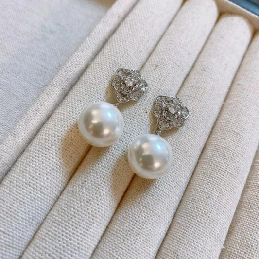 Obsessed with These Camellia Shell Pearl Earrings - Elegant Sparkly Jewelry That Matches Every Outfit in Your Wardrobe