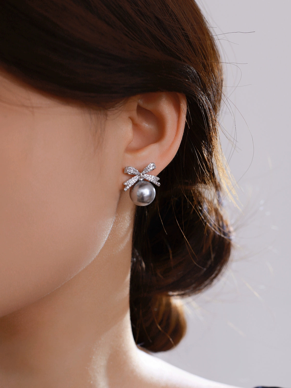 Bow pearl stud earrings women's 2025 new popular Aobai 12mm high-end light luxury texture temperament sterling silver