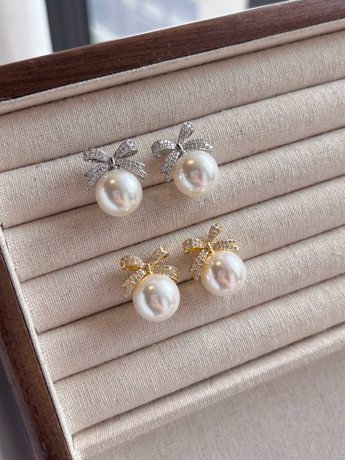 Bow pearl stud earrings women's 2025 new popular Aobai 12mm high-end light luxury texture temperament sterling silver