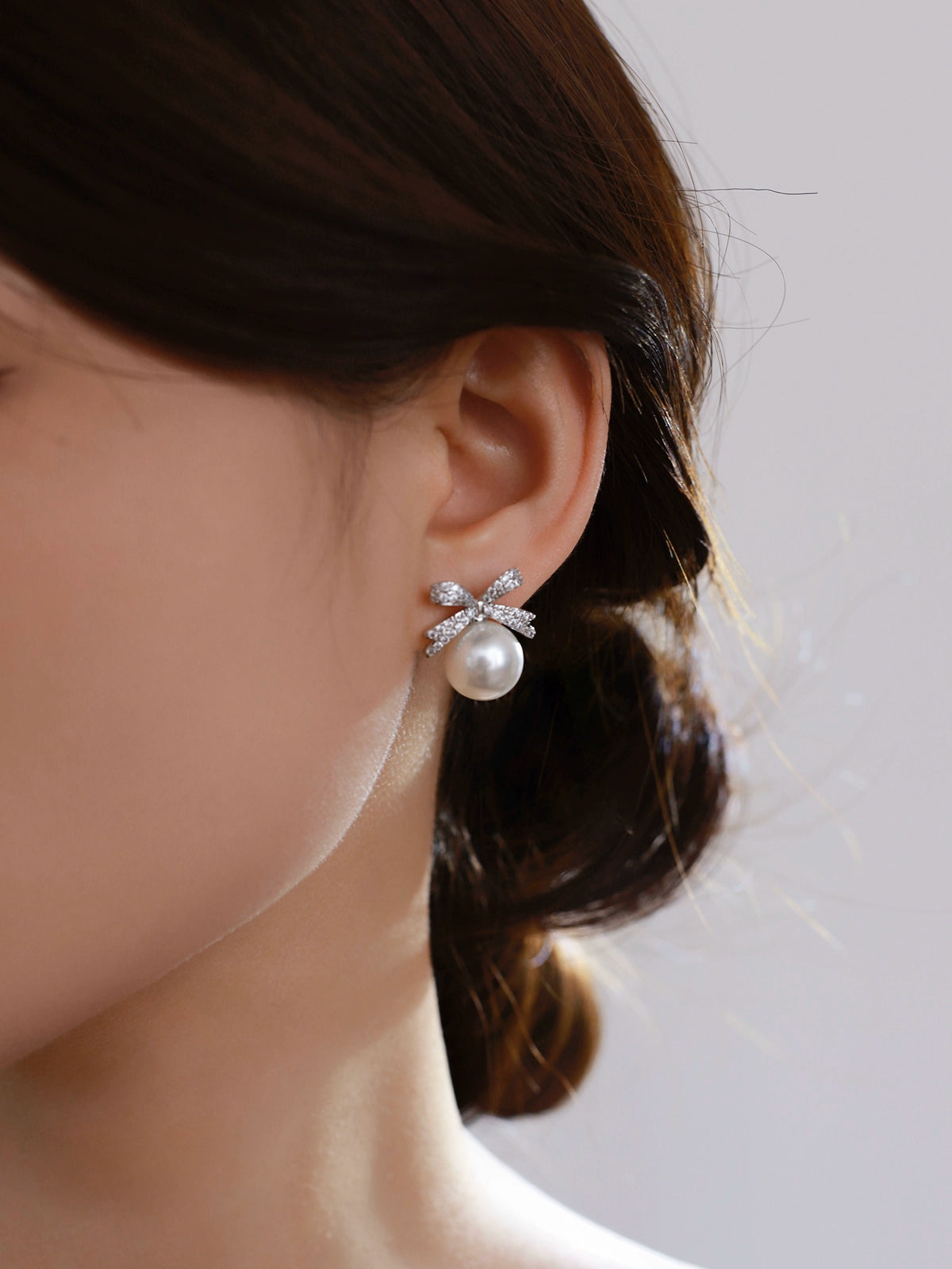 Bow pearl stud earrings women's 2025 new popular Aobai 12mm high-end light luxury texture temperament sterling silver