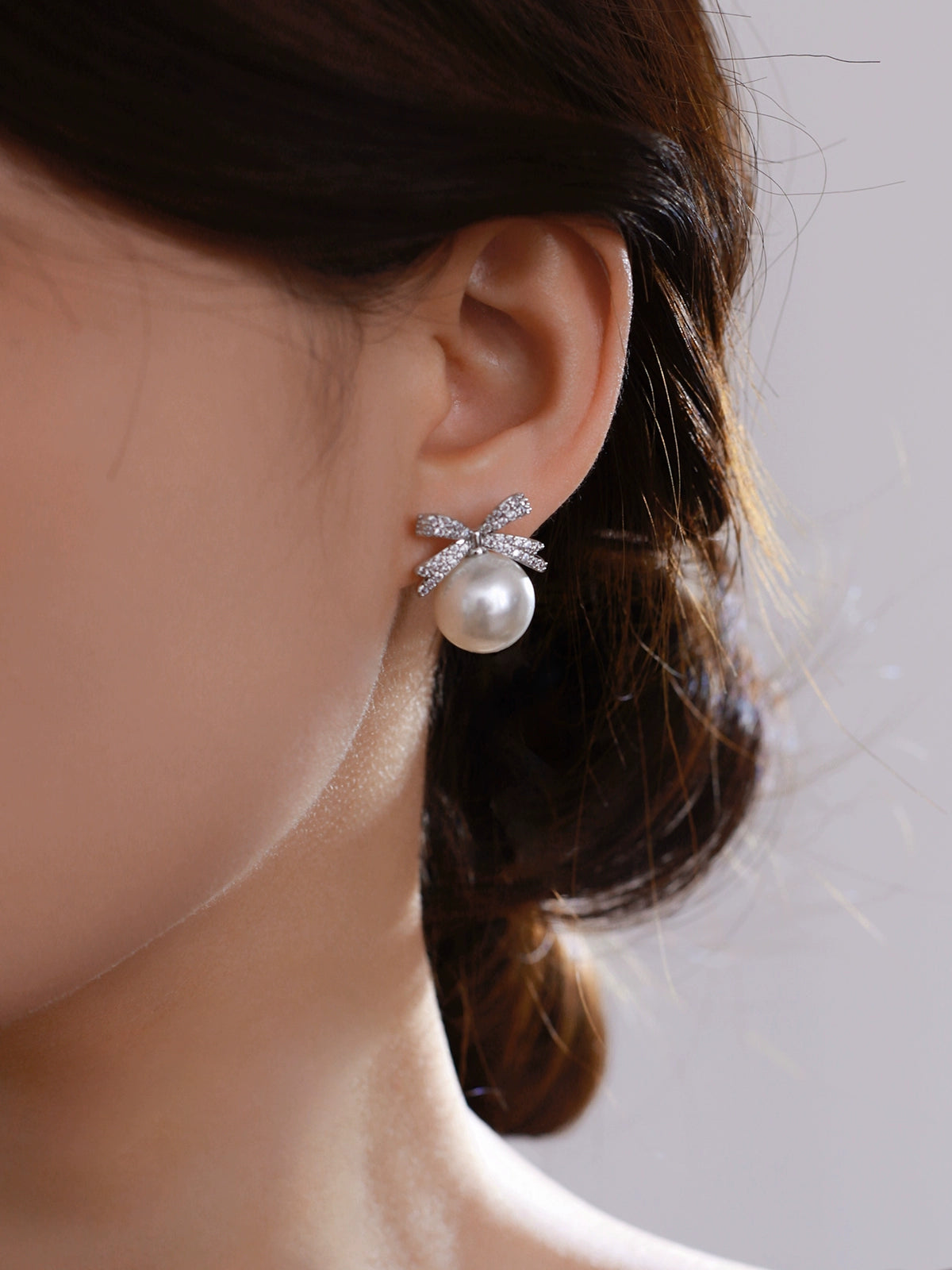 Bow pearl stud earrings women's 2025 new popular Aobai 12mm high-end light luxury texture temperament sterling silver