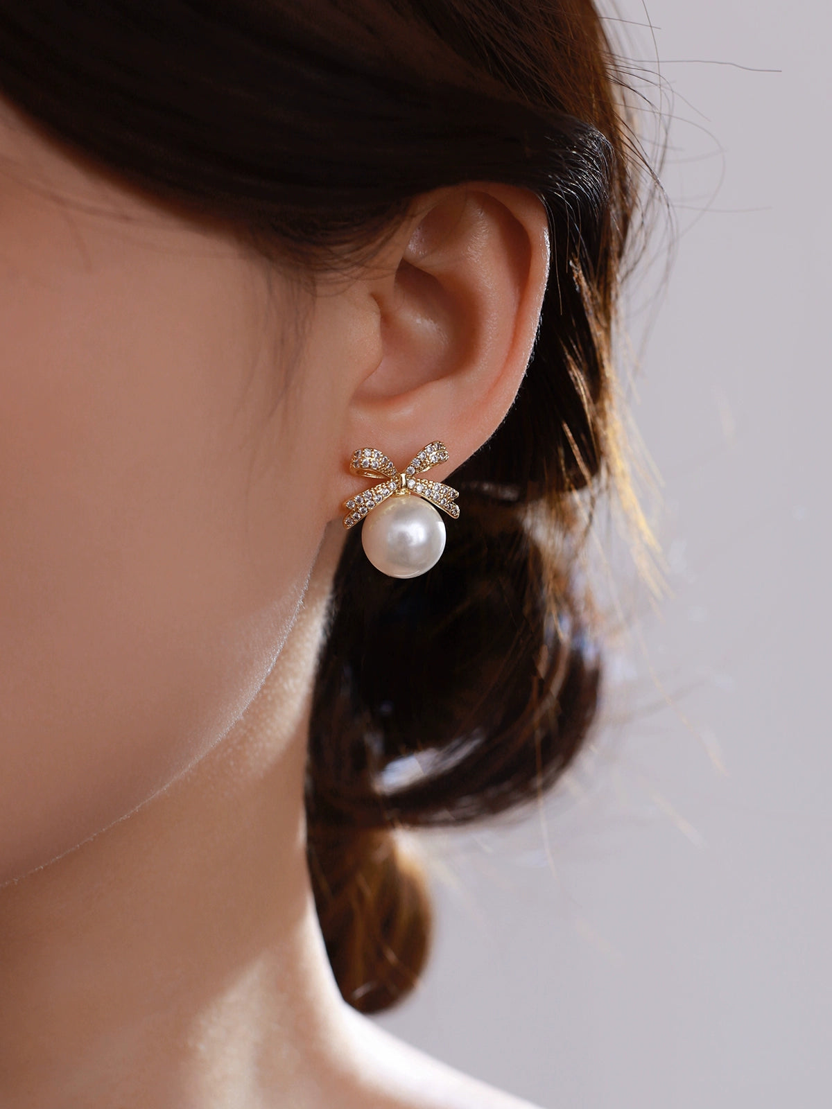 Bow pearl stud earrings women's 2025 new popular Aobai 12mm high-end light luxury texture temperament sterling silver