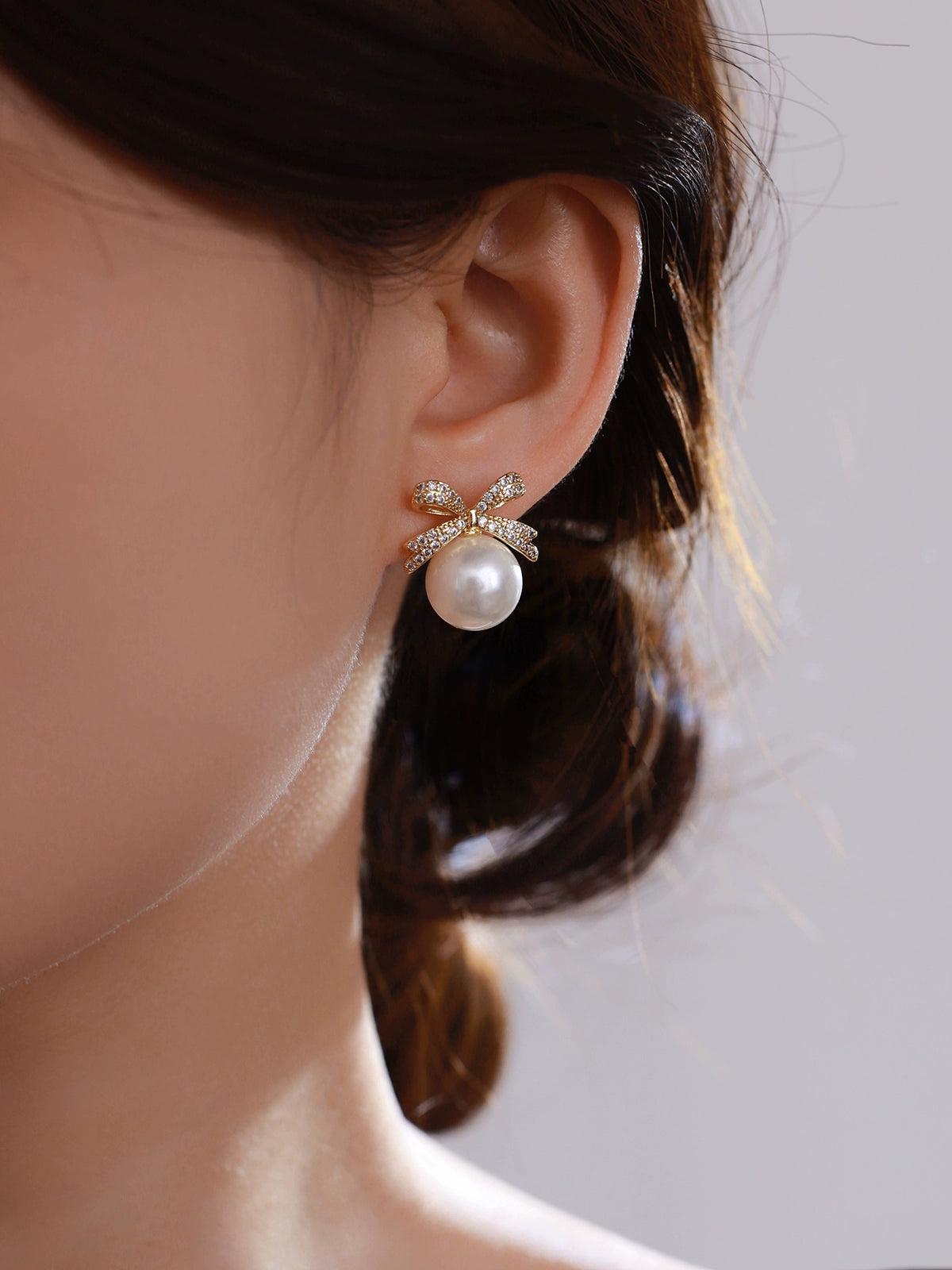 Bow pearl stud earrings women's 2025 new popular Aobai 12mm high-end light luxury texture temperament sterling silver