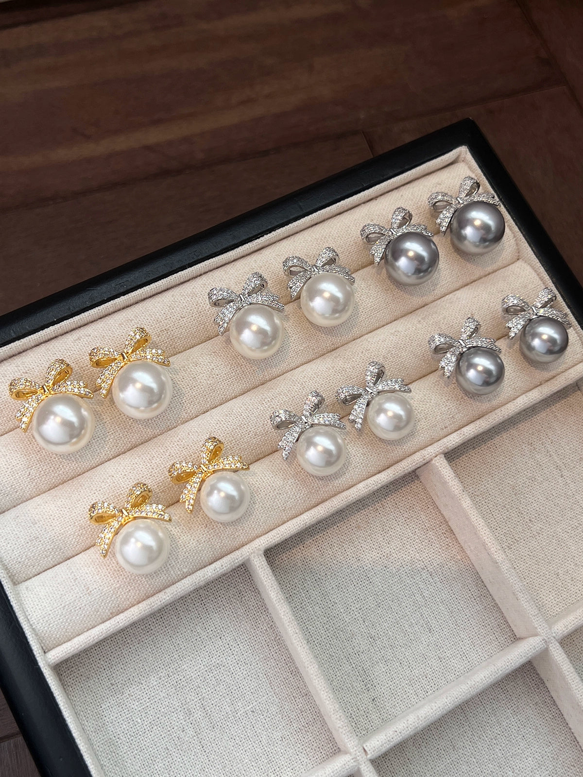 Bow pearl stud earrings women's 2025 new popular Aobai 12mm high-end light luxury texture temperament sterling silver