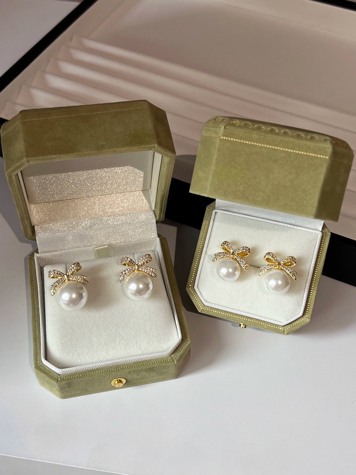 Bow pearl stud earrings women's 2025 new popular Aobai 12mm high-end light luxury texture temperament sterling silver