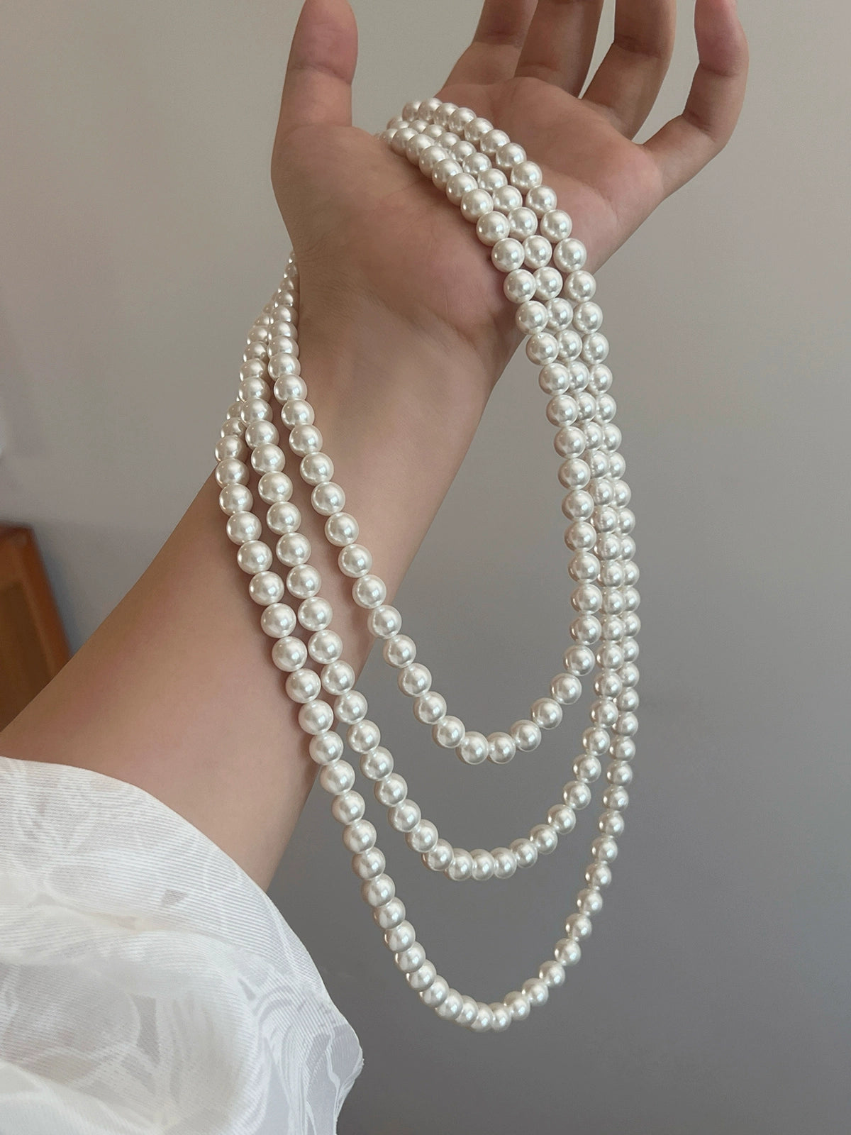 White Pearl Necklace | Long Sweater Chain in Hepburn Style | 2025 New Trend for Women | Stacked & Worn Design | Light Luxury Niche Jewelry