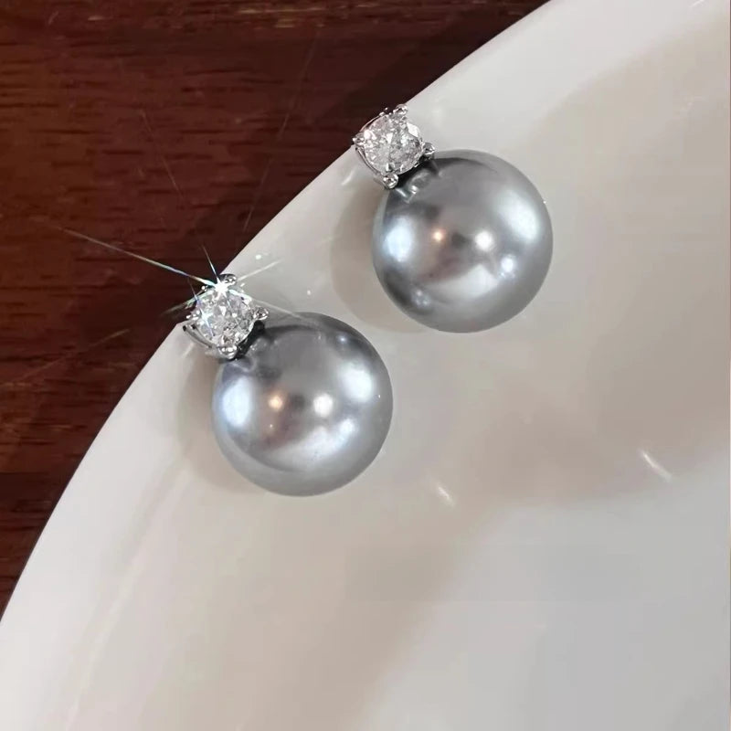 Princess Diana pearl stud earrings women's 2026 new temperament light luxury high-end earrings with diamonds Princess Aobai  she
