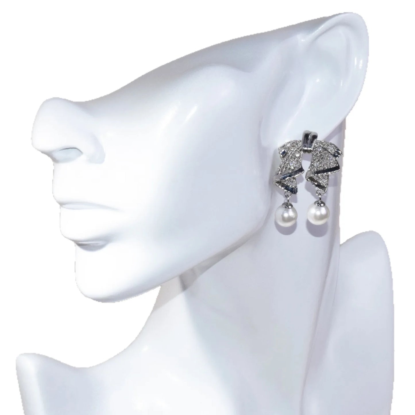 Hollow out large bow, exquisite mother shell pearl earrings, women's versatile earrings, fashionable and simple temperament