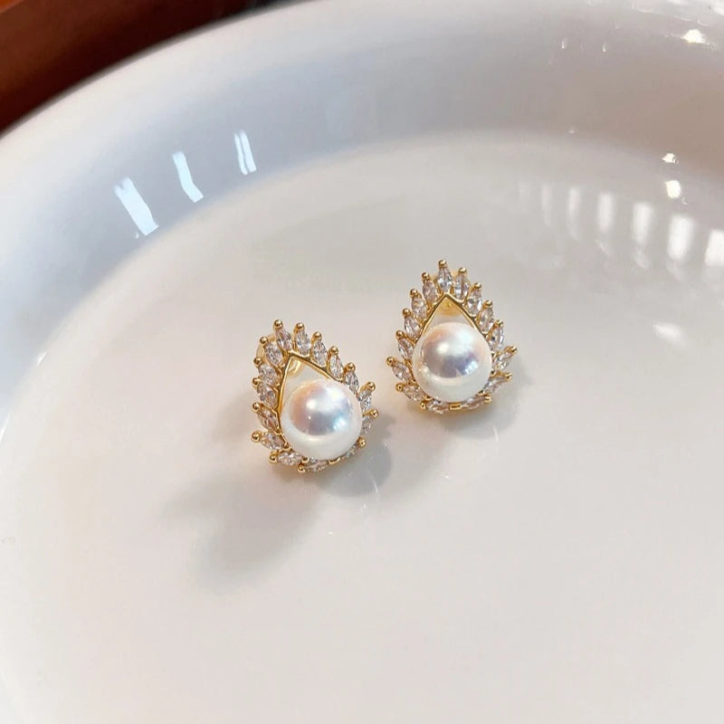 Pearl stud earrings with diamonds and zircon women's 2026 new Tiannu light luxury high-end earrings temperament 12mm  shell pear