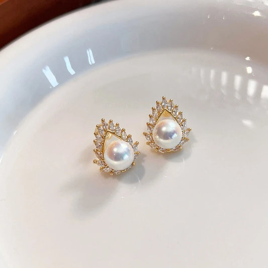 Pearl stud earrings with diamonds and zircon women's 2026 new Tiannu light luxury high-end earrings temperament 12mm  shell pear