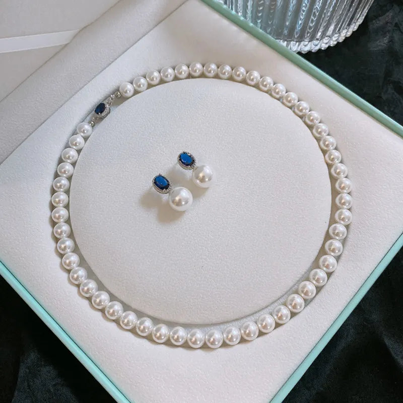 Windsor Sapphire, white pearl stud earrings, feminine versatile celebrity light luxury high-end strong light earrings