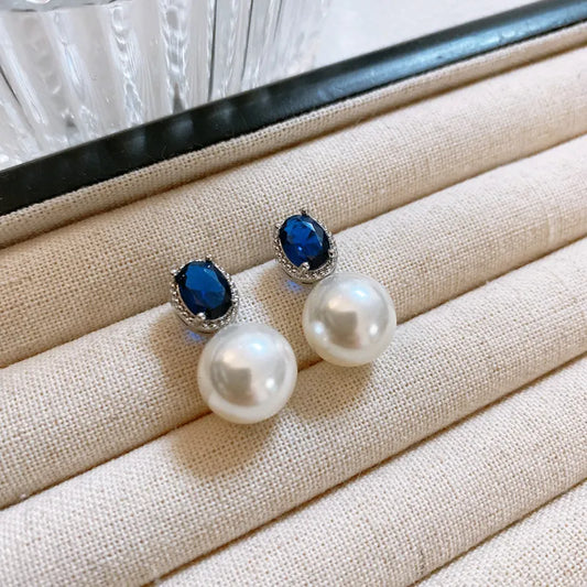 Windsor Sapphire, white pearl stud earrings, feminine versatile celebrity light luxury high-end strong light earrings