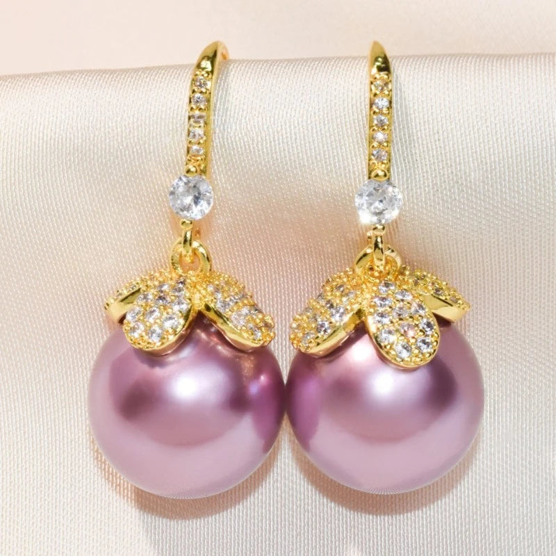 Luxurious four petal flower pearl earrings, mother pearl hooks and pendants, fashionable and high-end versatile pearl earrings