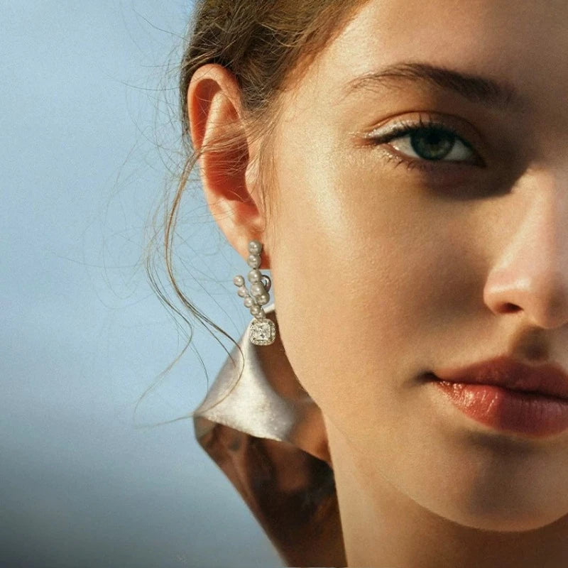 Elegant Curved Shell Pearl Clip-On Earrings with Sparkling Square Zircon – Timeless Silver-Tone Jewelry