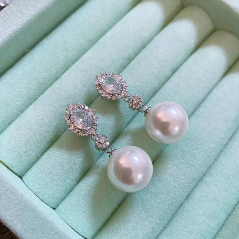Garden pigeon eggs, Venus white pearl stud earrings, feminine French retro diamond-set premium earrings