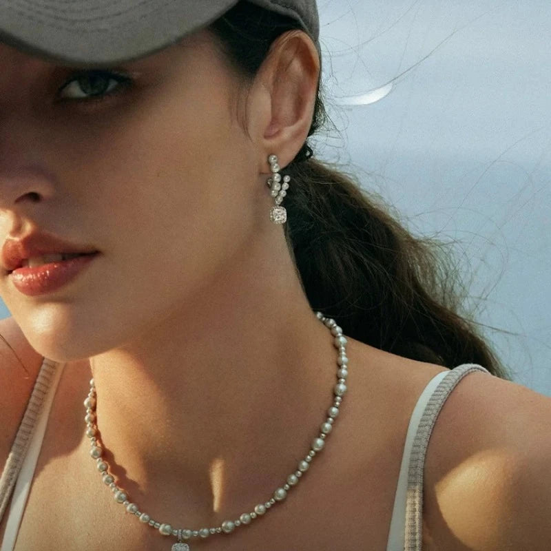 Elegant Curved Shell Pearl Clip-On Earrings with Sparkling Square Zircon – Timeless Silver-Tone Jewelry