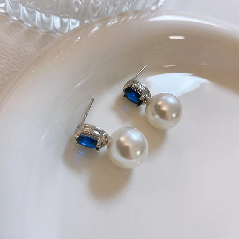 Windsor Sapphire, white pearl stud earrings, feminine versatile celebrity light luxury high-end strong light earrings