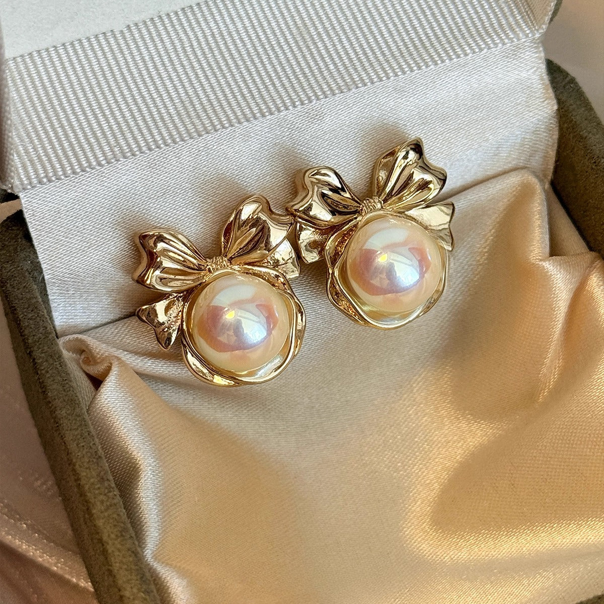 High-End Light Luxury White Pearl Bow Stud Earrings for Women - 2025 Collection