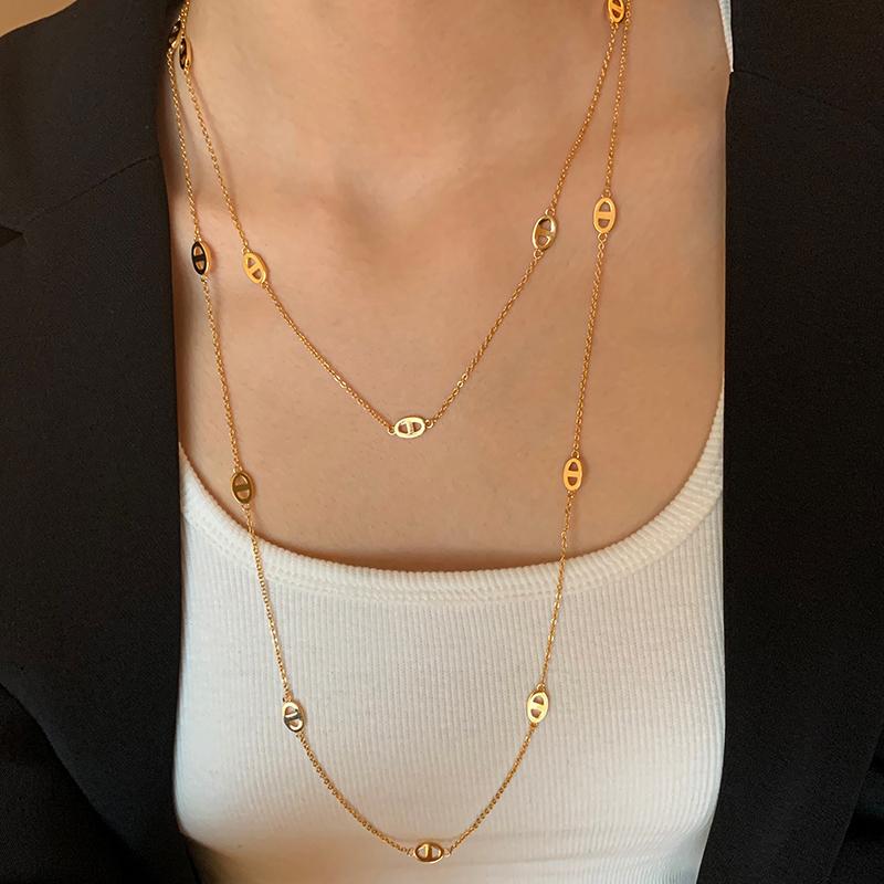 Double-layered long necklace woman gold, silver