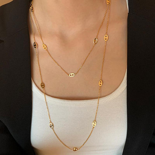 Double-layered long necklace woman gold, silver