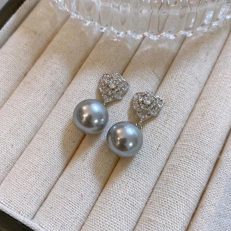 Obsessed with These Camellia Shell Pearl Earrings - Elegant Sparkly Jewelry That Matches Every Outfit in Your Wardrobe